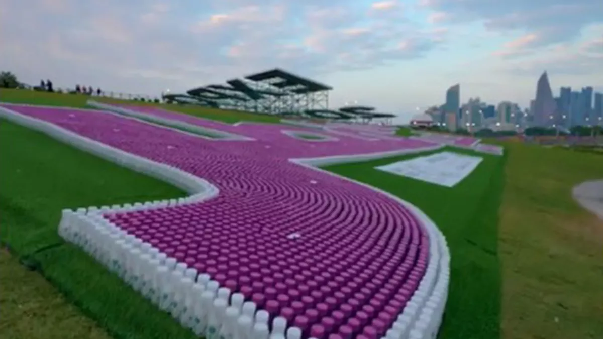 "Qatar's finest" words in Arabic with 35,000 plastic bottles at the Expo site achieves Guinness World Record