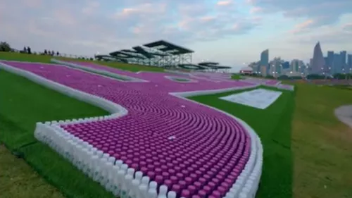 "Qatar's finest" words in Arabic with 35,000 plastic bottles at the Expo site achieves Guinness World Record